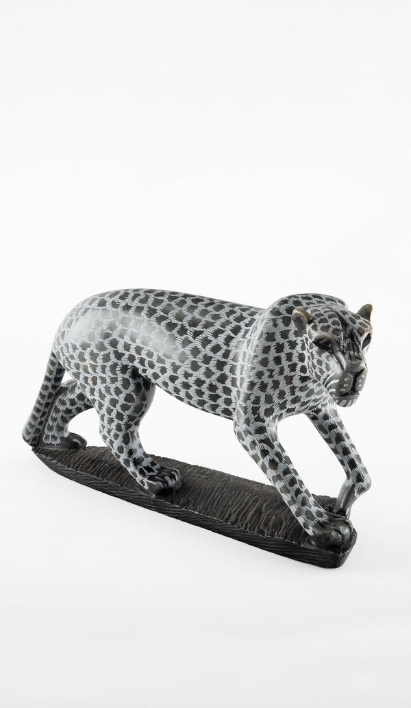The Silent Stalk: Carved Soapstone Leopard