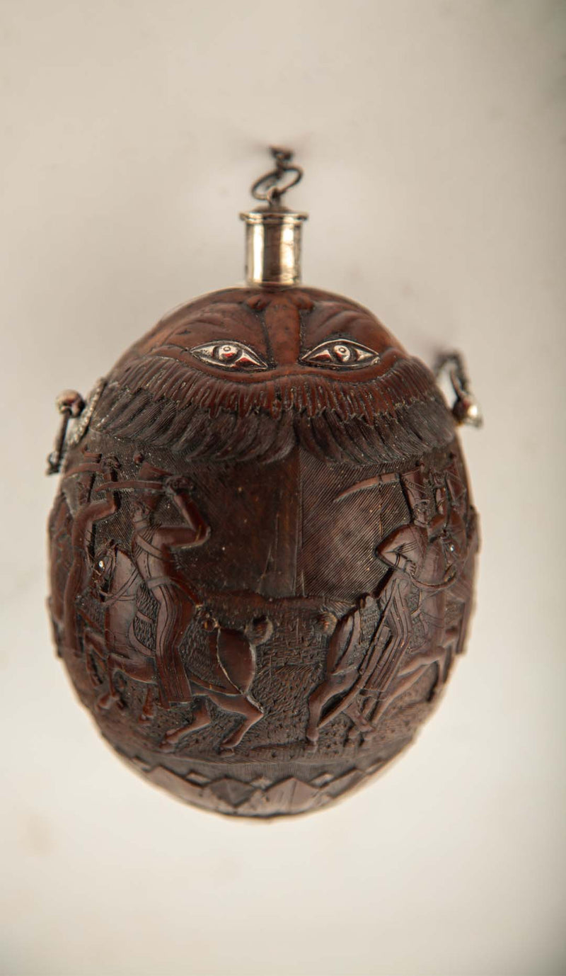 French Colonial Carved Coconut "Bugbear" Flask with Silver Mounts, 18/19th C.