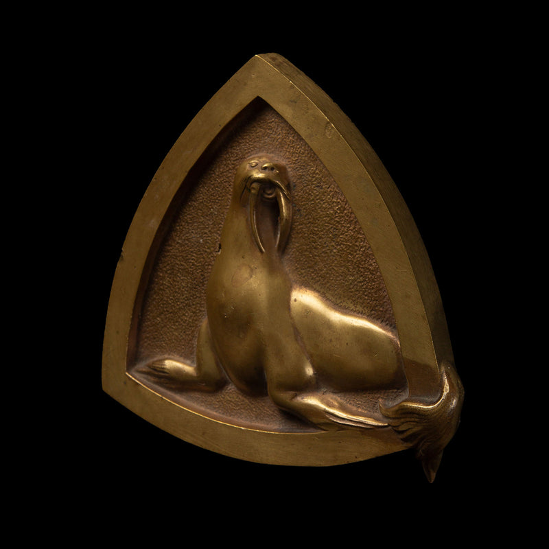 Triangular Plaque Depicting a Walrus