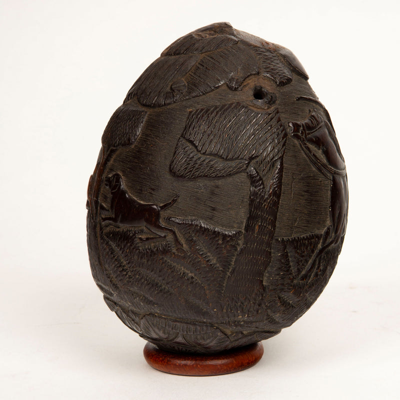 Hunting Tales: Rare 19th-Century French Colonial Carved Coconut Bugbear Flask