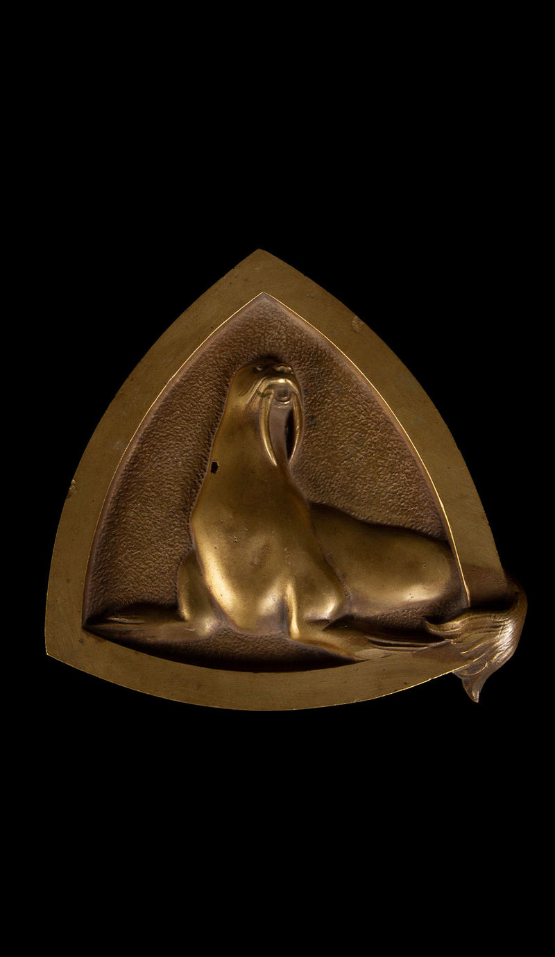 Triangular Plaque Depicting a Walrus