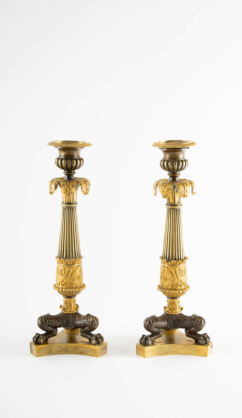 Guardians of the Flame: Pair of Early 19th C Gilt Bronze French Candlesticks