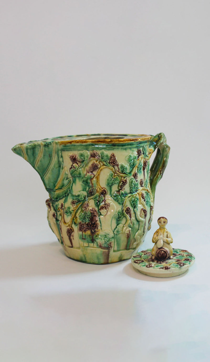 Bacchus-Decorated Majolica Pitcher with Figural Finial, Early 20th Century