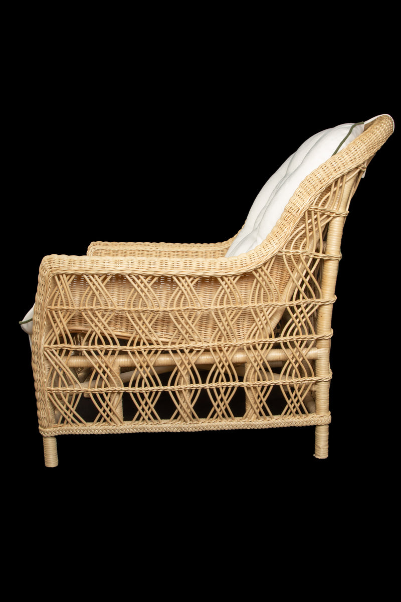 The Dana Wicker Scoop Chair by Creel and Gow