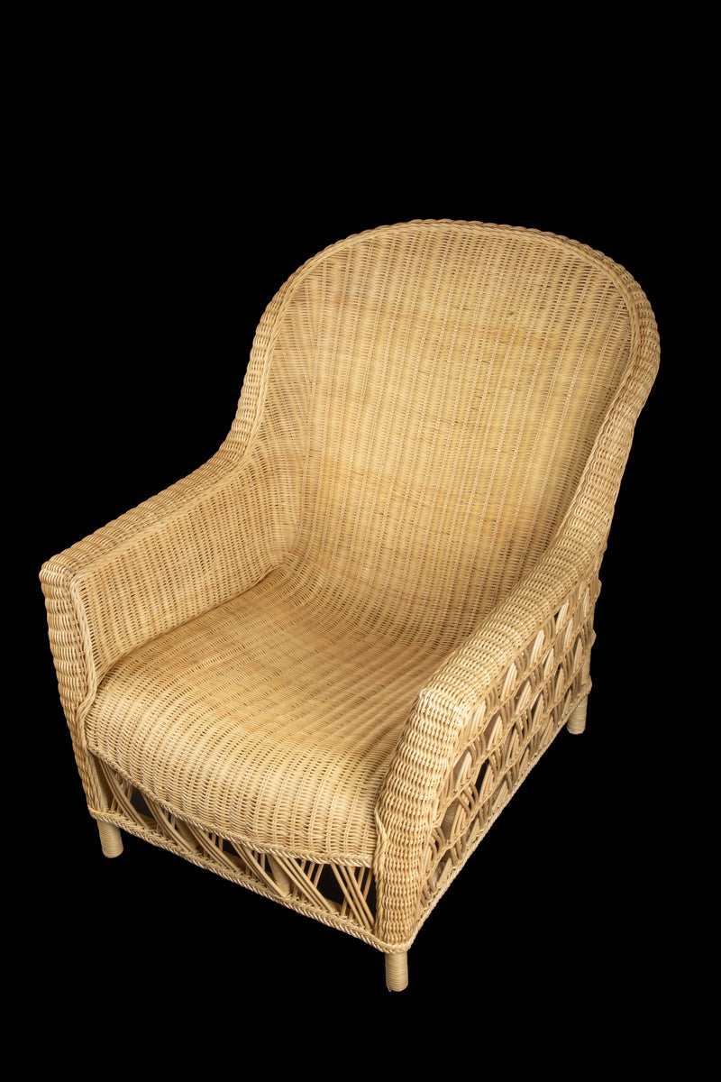 The Dana Wicker Scoop Chair by Creel and Gow