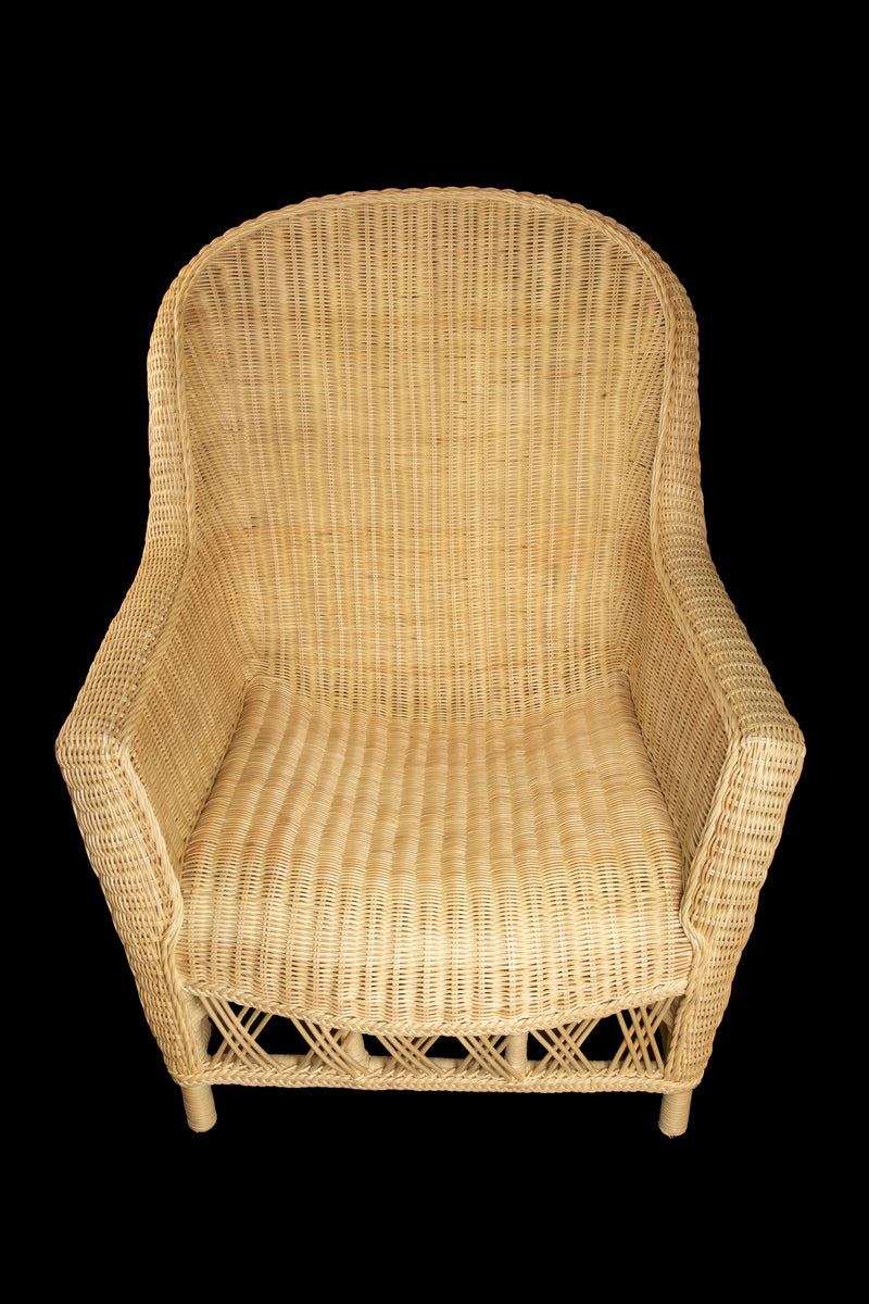 The Dana Wicker Scoop Chair by Creel and Gow