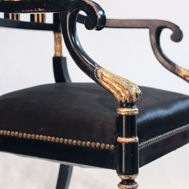 Pair of Regency Ebonized Armchairs with Parcel Gilt Decoration