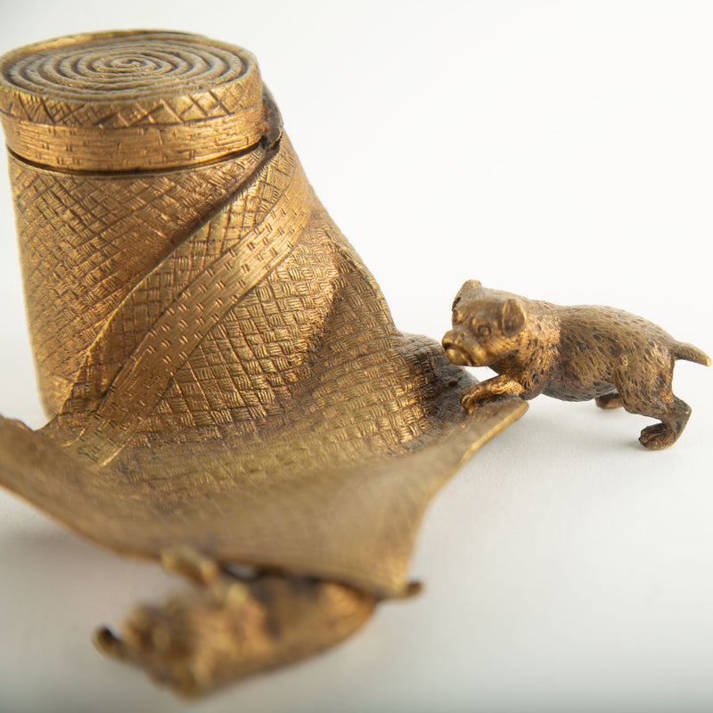 Tug of War: A Bronze Inkwell of Tugging Pugs on a Rug