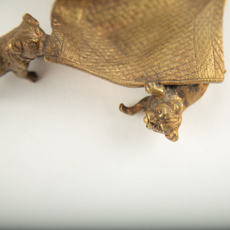 Tug of War: A Bronze Inkwell of Tugging Pugs on a Rug
