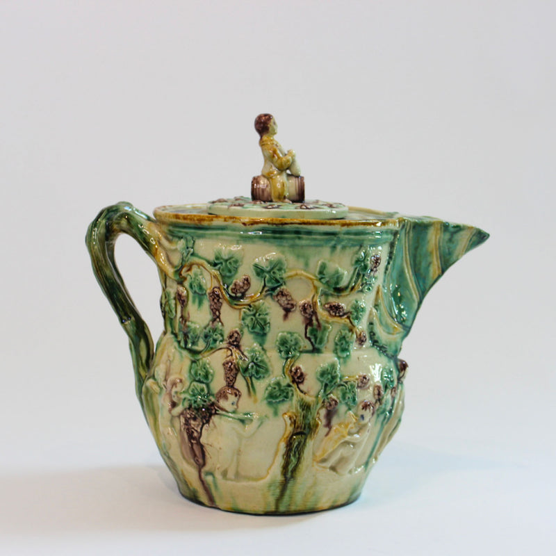 Bacchus-Decorated Majolica Pitcher with Figural Finial, Early 20th Century