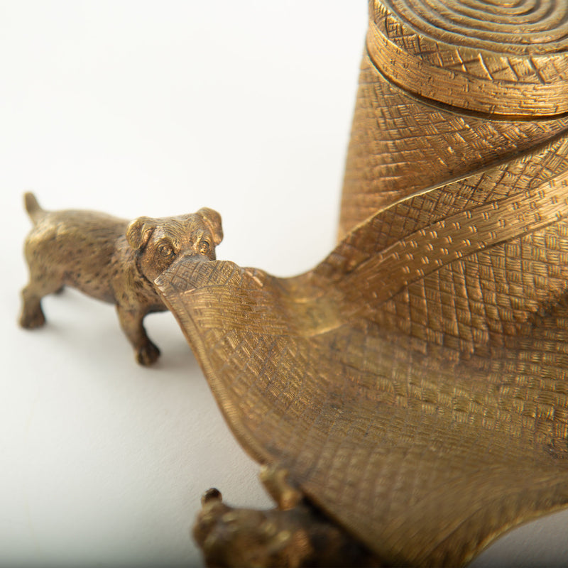 Tug of War: A Bronze Inkwell of Tugging Pugs on a Rug