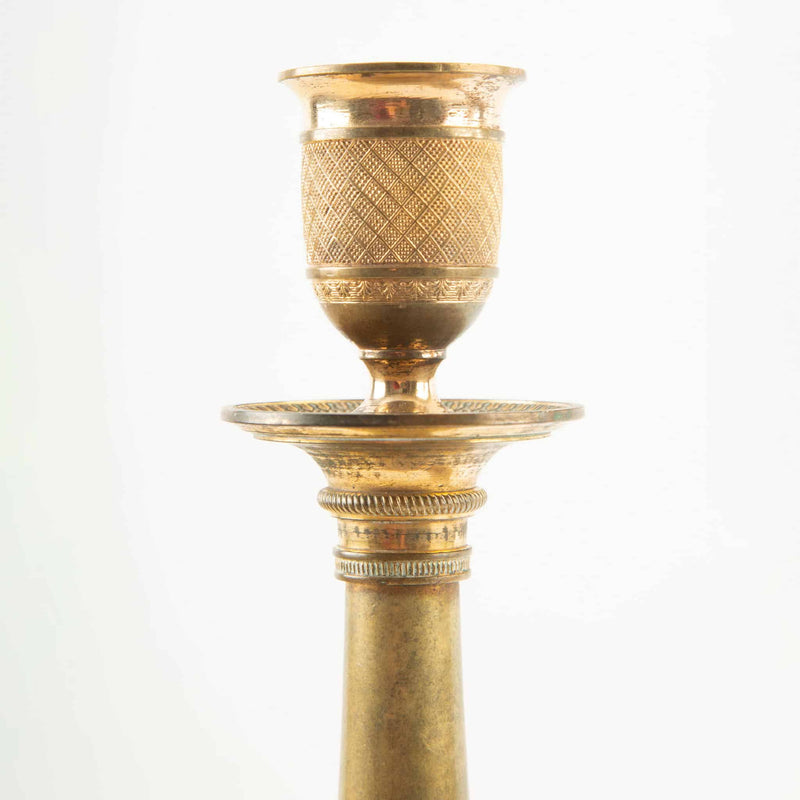 Pair of French Empire Period Gilt Bronze Candlesticks with Guilloché Decoration