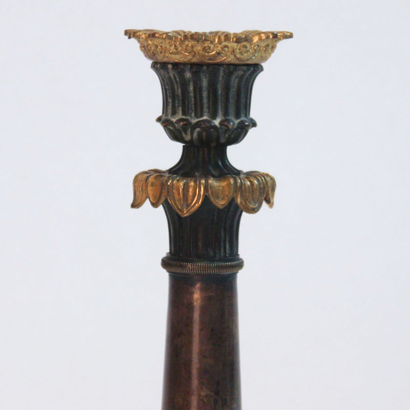 Napoleonic Elegance: A Pair of French Empire Bronze Candlesticks; 12" H