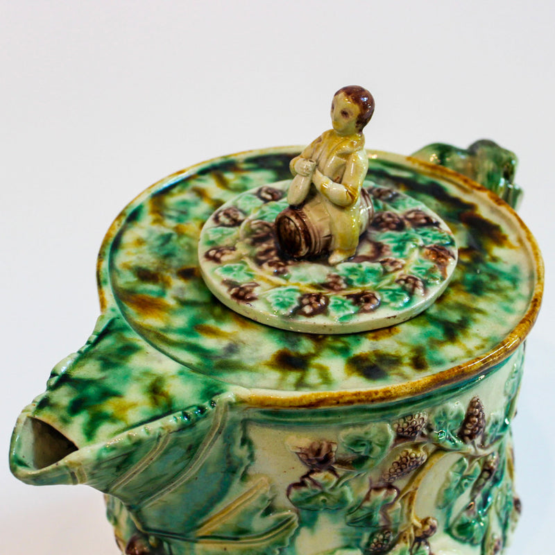 Bacchus-Decorated Majolica Pitcher with Figural Finial, Early 20th Century