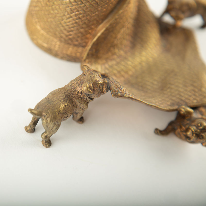 Tug of War: A Bronze Inkwell of Tugging Pugs on a Rug