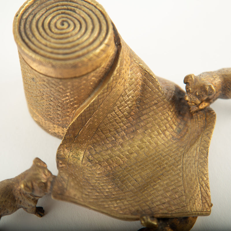 Tug of War: A Bronze Inkwell of Tugging Pugs on a Rug