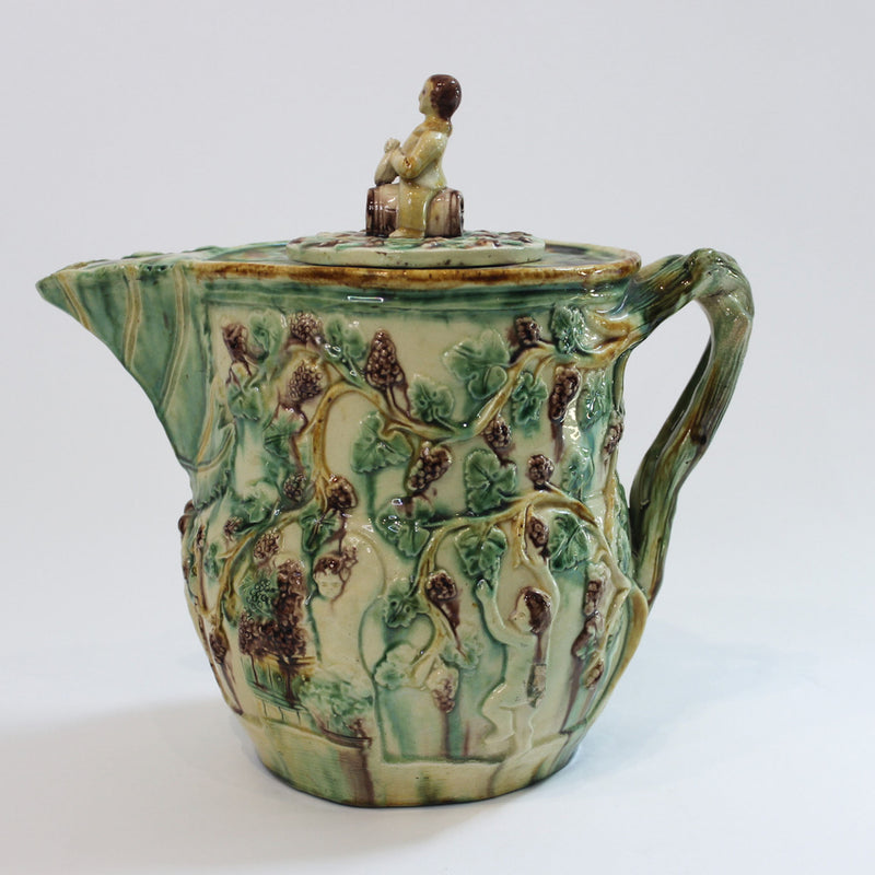 Bacchus-Decorated Majolica Pitcher with Figural Finial, Early 20th Century