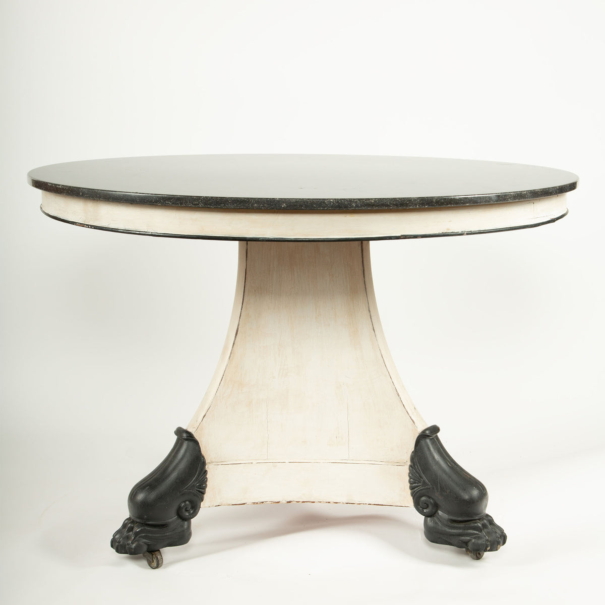 The Lion’s Foot Table: 19th C Center Table w/ Marble Top and Iron Lion Paw Feet