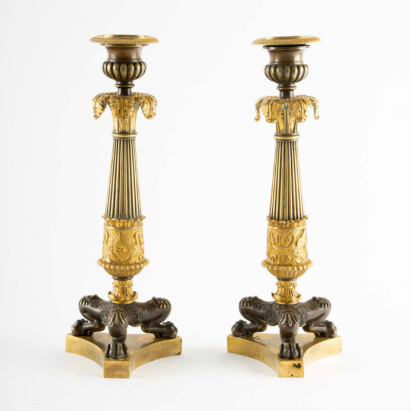 Guardians of the Flame: Pair of Early 19th C Gilt Bronze French Candlesticks