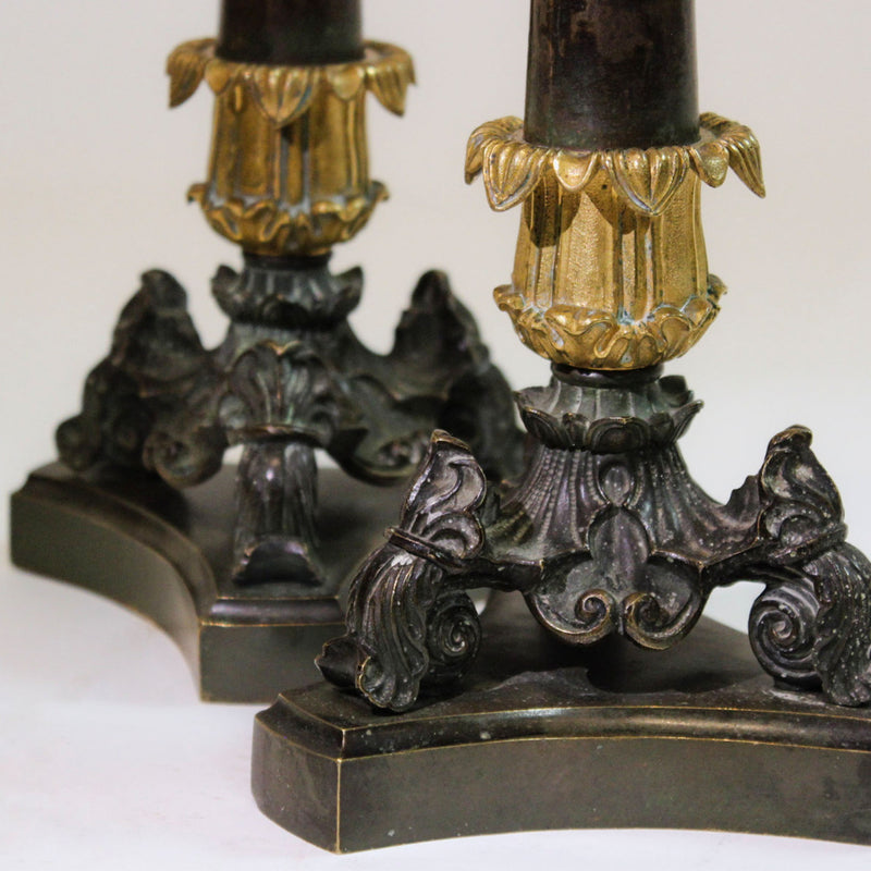 Napoleonic Elegance: A Pair of French Empire Bronze Candlesticks; 12" H