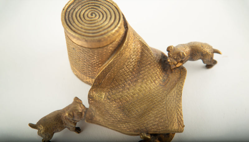 Tug of War: A Bronze Inkwell of Tugging Pugs on a Rug
