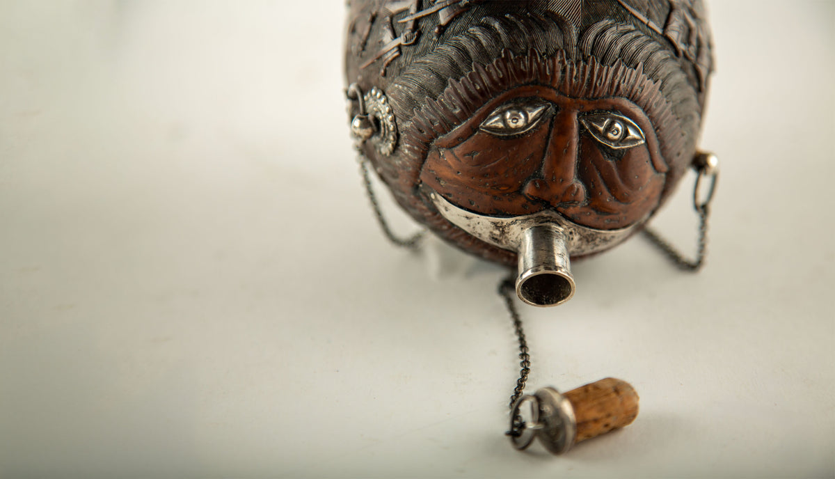 French Colonial Carved Coconut "Bugbear" Flask with Silver Mounts, 18/19th C.