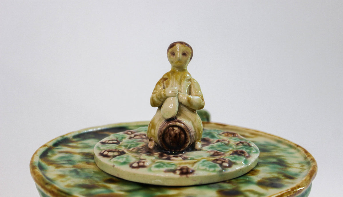 Bacchus-Decorated Majolica Pitcher with Figural Finial, Early 20th Century