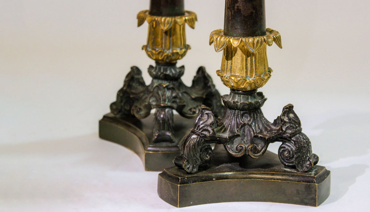 Napoleonic Elegance: A Pair of French Empire Bronze Candlesticks; 12" H